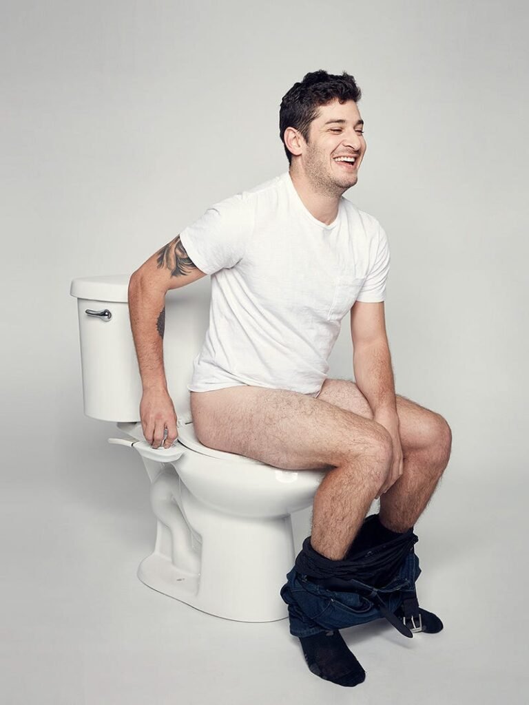 Man using a modern bidet 